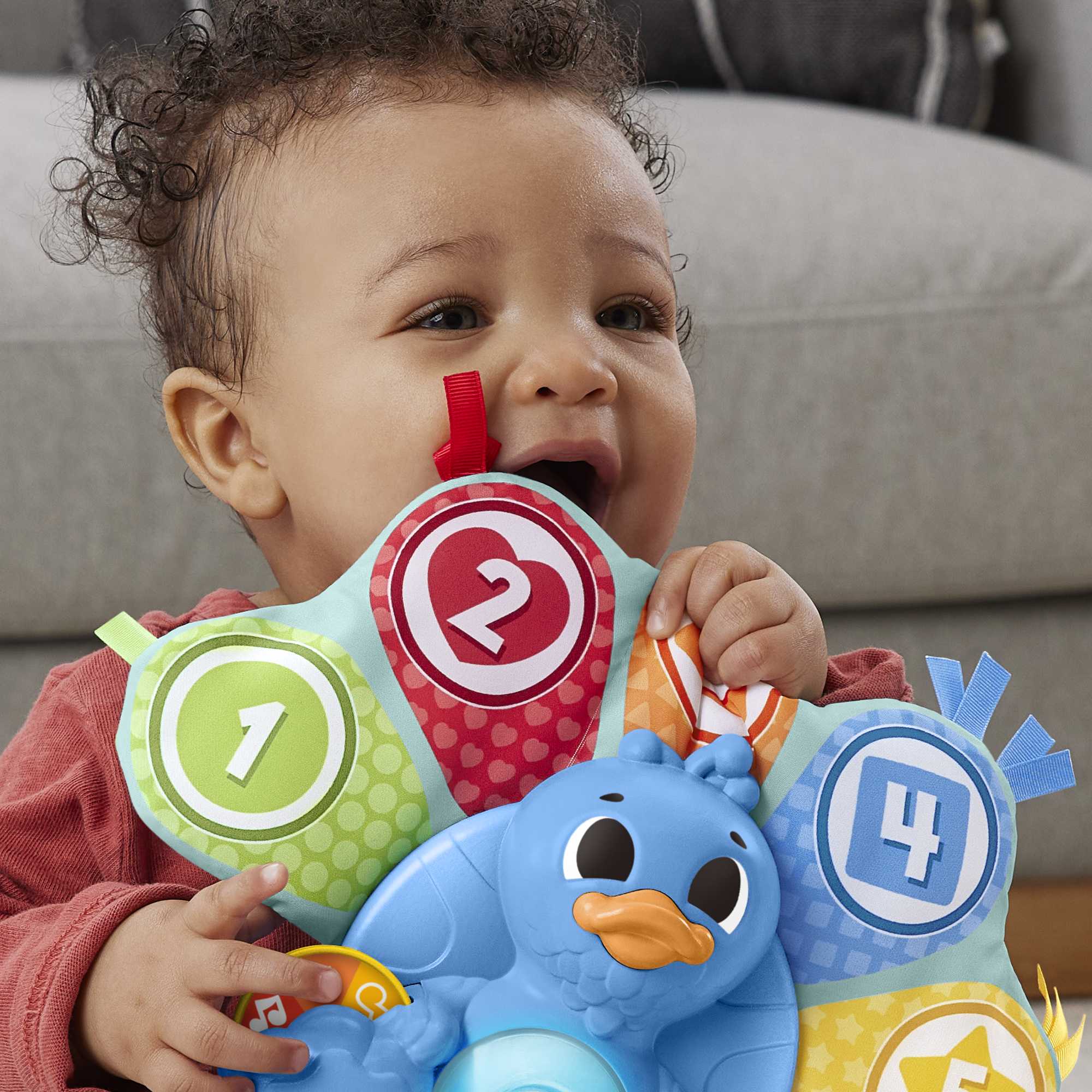 Fisher-Price Linkimals Juguete para Bebés Pavo Real Plumas Coloridas